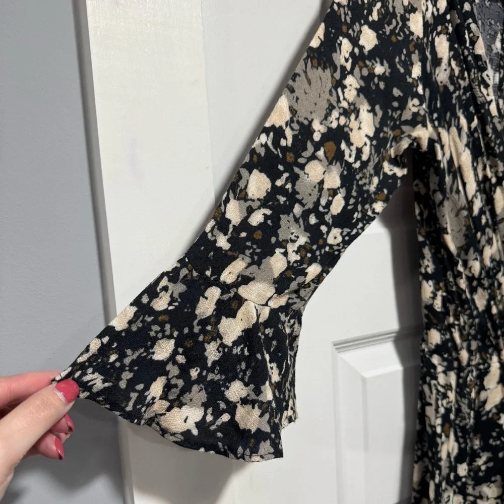 Free People Black and Cream Floral Wrap Romper with 3/4 Sleeves 02-0074